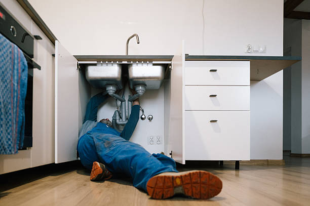Professional Drain Cleaning technician working in Harrison, NJ